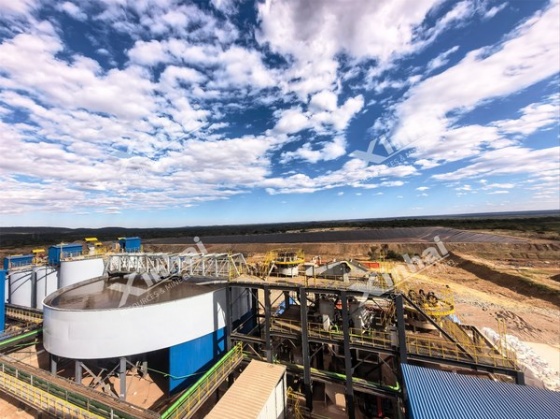 Thickener, cyclones and stacked tailings at a gold plant